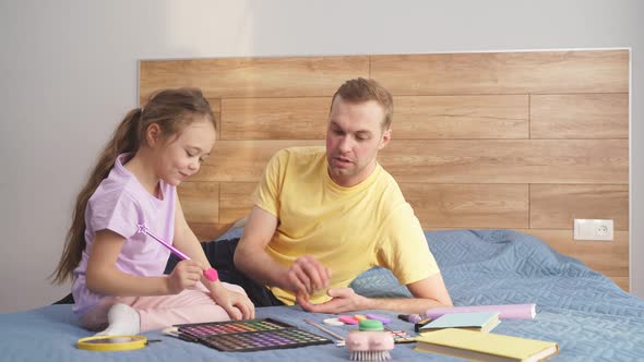 Little Cute Daughter Doing Makeup to Her Father alt