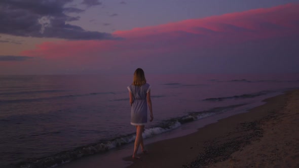 Medium To Close View Beautiful Young Woman Walking at Sea on the Beach Enjoying Amazing Tender alt