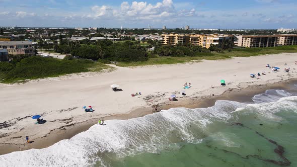 Touristic Cocoa Beach in Florida with People on Summer Vacation, Aerial alt