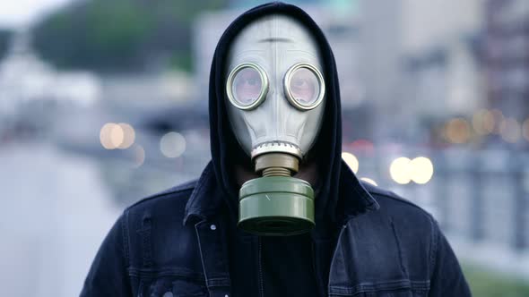 Portrait of man with respirator at the street.