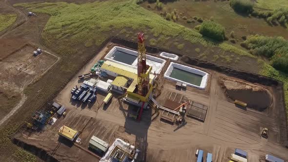Oil and Gas Well in Field in Summer Day, Aerial View