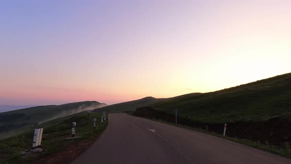 Point Of View Drive In Mountains On Sunset alt