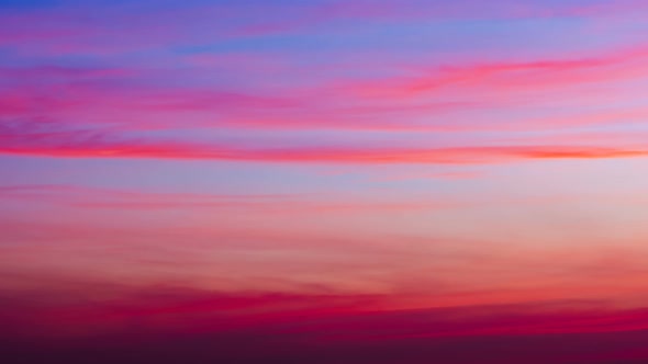 Time lapse sunset sunrise and beautiful twilight fluffy storm cloudy blue and yellow sky alt