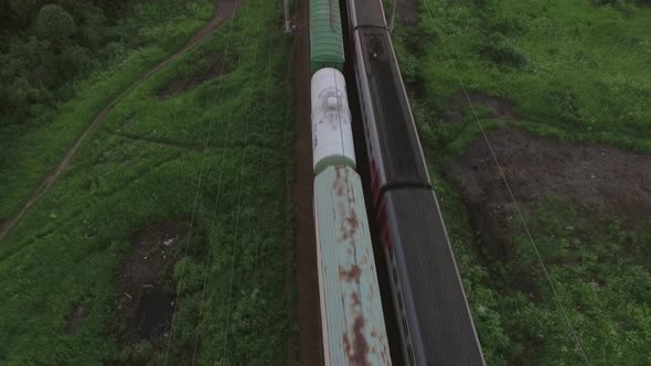 Aerial Bird Eye View of Two Railway Different Direction and Moving Trains, Russia alt