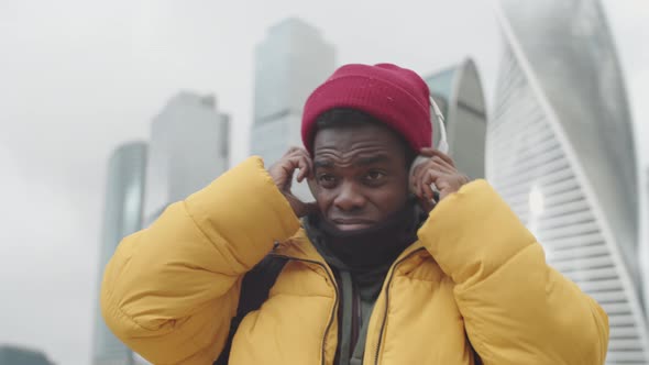 Man Listening to Music Outdoors alt