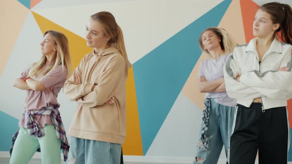 Creative Young People Learning To Dance in Hip-hop Class Moving Arms and Bodies alt
