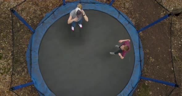 Trampoline Mom And Son