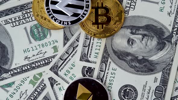 Bitcoin, Litecoin LTC and Ethereum Coins on Cash Dollars