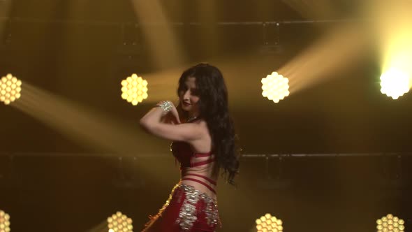 Young Female Belly Dancer Performs Classical Movements of Oriental Dance, Smooth Hand Movements alt