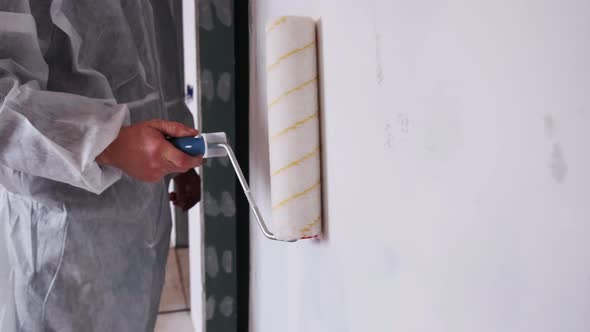 Closeup Painting of Walls with a Roller