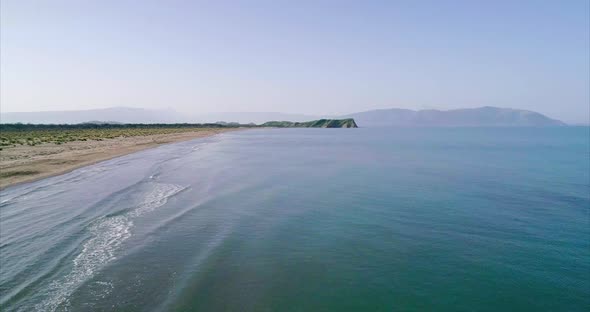 Flying Over the Adriatic Sea by a Remote Virgin Sandy Beach alt
