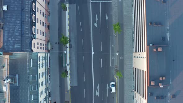 Peaceful street aerial rooftop view from above alt