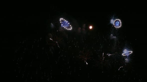 Colorful Firework display at night on sky background alt