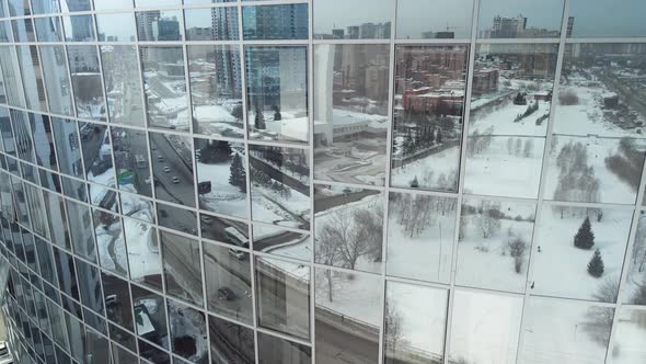 Many Windows Reflect the Winter City alt