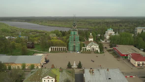Aerial View on Central Square with Church Under Reconstruction in Small Town