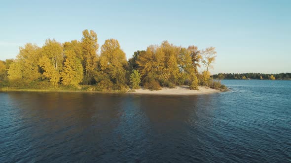  Aerial Drone Footage. Flyaway Autumn Island on River