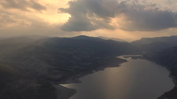 Aerial video of a big river during magical sunset