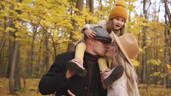 Family Have Fun in Autumn Park Nature