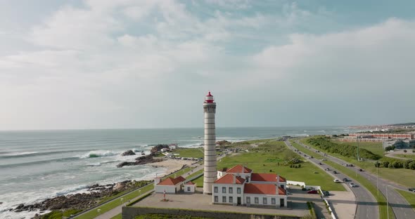 Aerial view over the lighthouse and Capela da Boa Nova in Leça da Palmeira, Matosinhos. alt