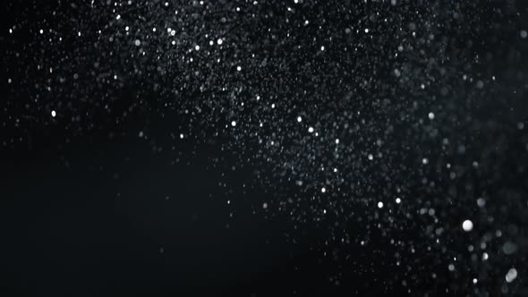 SIlver Glitter Background in Super Slow Motion at 1000Fps alt