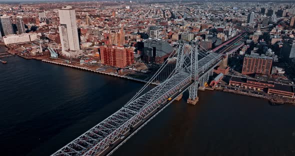 Williamsburg Bridge Across East River with East Village and New York City Skyscraper alt
