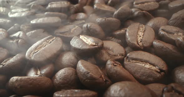 Macro Shot Roasting Coffee Beans Filmed in a Dark Key the Smoke Emanating From the Roasting of alt