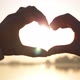Hands of Men and Women Came Together and Show Form the Symbol of a Heart Shape at Sunset - VideoHive Item for Sale