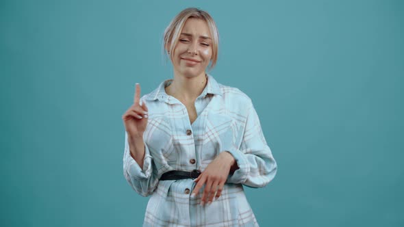 Dissatisfied Young Woman She Risks Her Hands Up and Says What Then Smiles alt