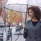 Young Beautiful African American Woman Curly Girl Female Tourist in Stylish Coat Stands in City in - VideoHive Item for Sale