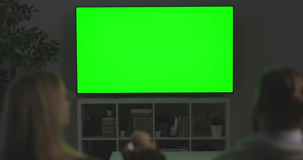 Couple Watching Green Screen TV alt