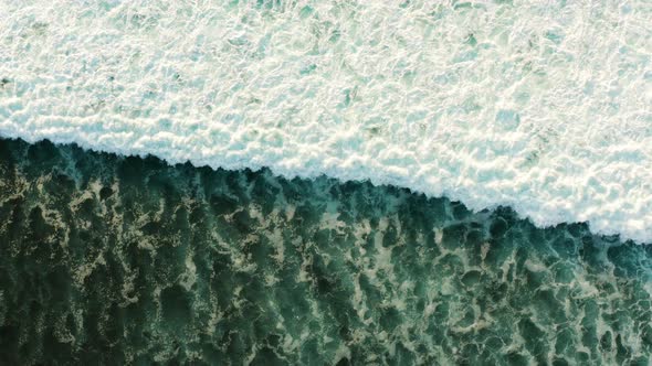 Aerial looking down onto waves