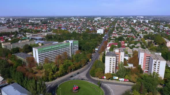 Aerial Drone Footage Kherson City Roundabout Green Trees Houses Ukraine