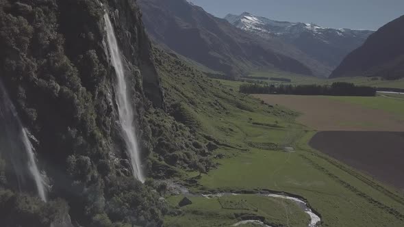 New Zealand landscape with waterfall