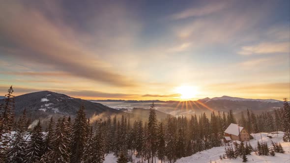 Foggy Morning in the Winter Mountains Forest on the Background of Dramatic Cloudy Sky. Timelapse.  alt