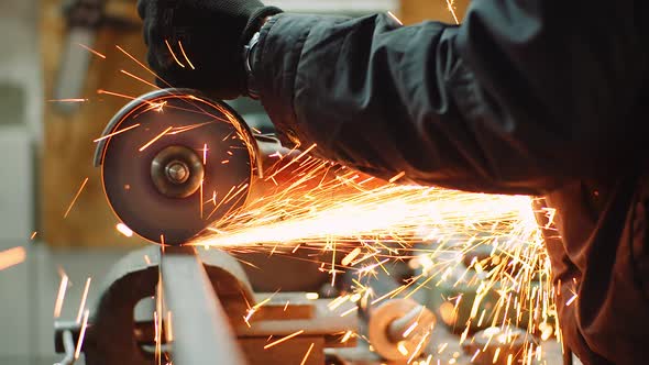 Falling Spark During Cutting Metal with Angle Grinder, Stock Footage