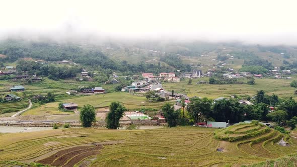 The Hmong Village in Sapa Vietnam on a Foggy Day with Rice Terraces and Forest alt
