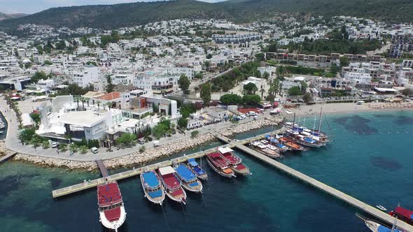 White Roofless Dense Terraced Houses by the Marine at the Seaside alt