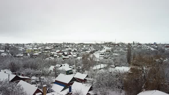 View of a Small Snowcovered Town From the Air
