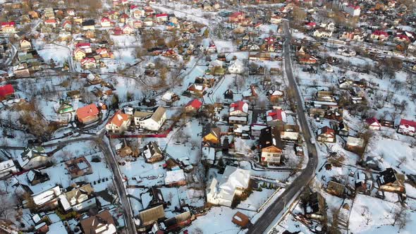 Aerial View of a Village in the Carpathian Mountains in Winter. Yaremche, Ukraine. alt