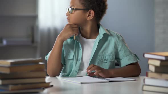 Schoolboy Thinking on Literature Essay, Doing Homework, School Education alt