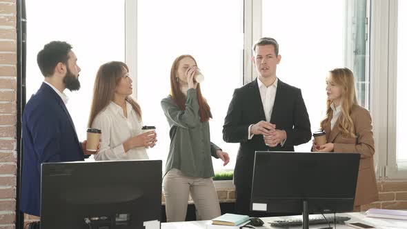 Cheerful Group of Partners Having Good Work Time in Office alt