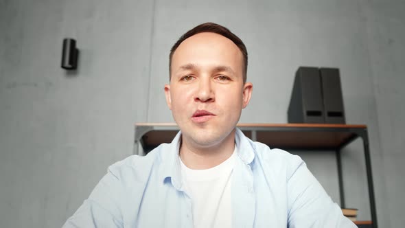 Professional manager man with artificial bio limb prothesis waves hand alt