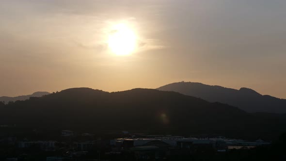Sunset Goes Into Sunset Over Hills and Valley Timelapse