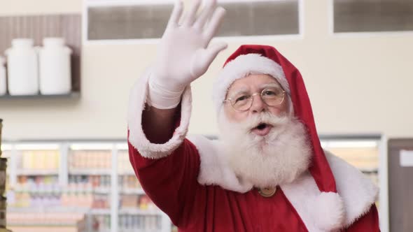 Santa Claus doing grocery shopping at the supermarket