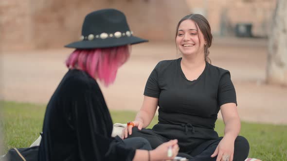 Smiling White Beautiful Girl Listens with Interest to Her Friend Slowmotion alt
