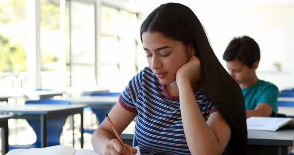 Student studying in classroom alt