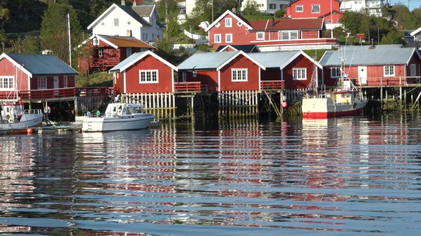 Traditional Norwegian fisherman's cabins, rorbuer, on the Lofoten islands. Summer of Norway. alt