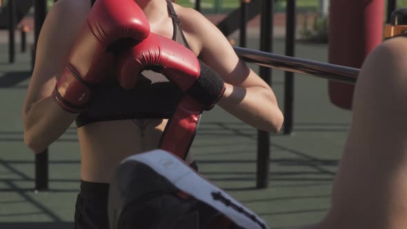 Sport Couple Practicing Boxing Outdoors alt