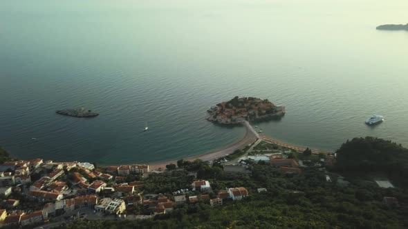 Aerial view of St. Stephen's Island in Montenegro. Flying over the sea and mountains alt