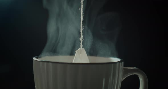 Tea Bag in a White Cup of Tea alt